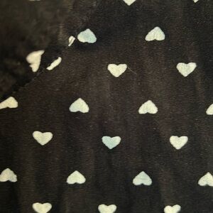 Heart print sleeveless shirt